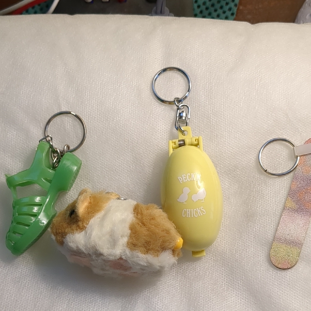 vintage key rings: sandal, hamster, emery board, flower,  egg dome with  chicks
